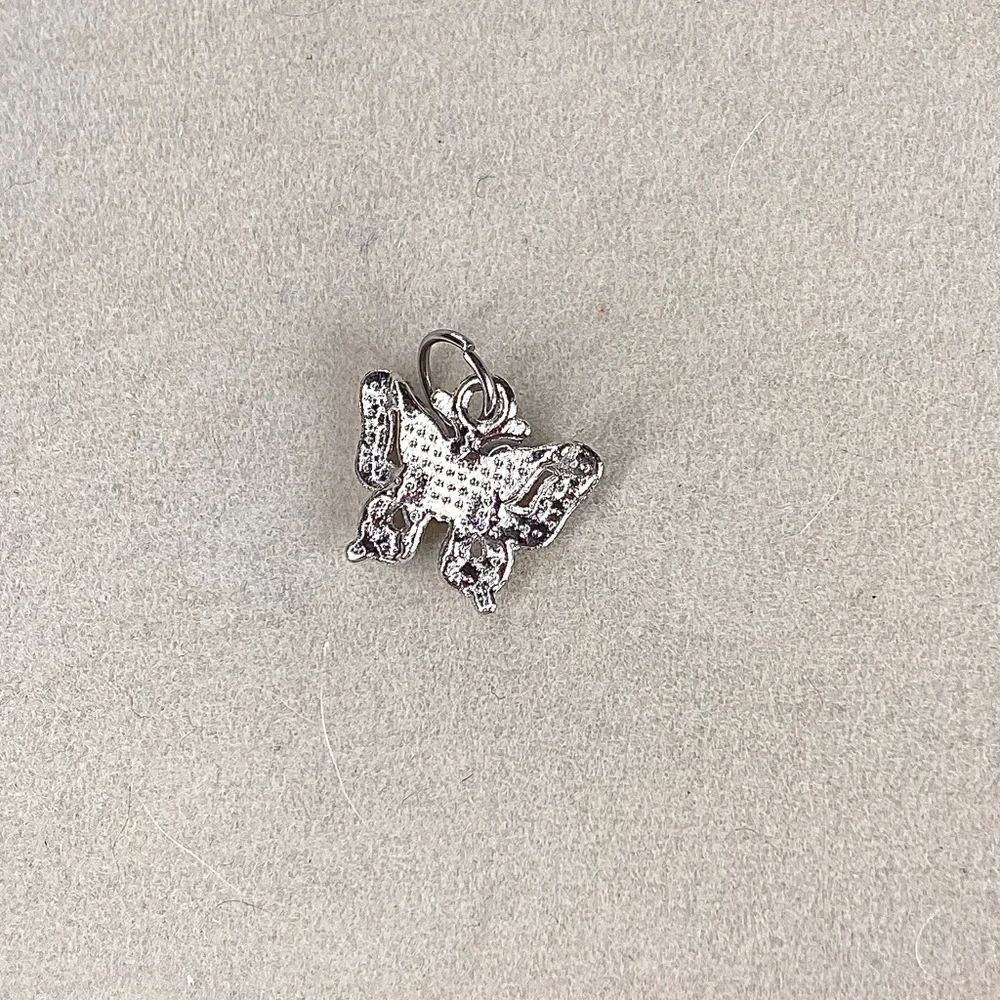 N/A butterfly 	•	pastel details